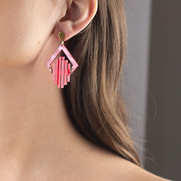 Model wearing pink Art Deco Pop earrings