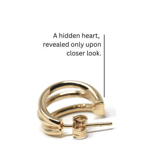 Small gold hoop earrings Trinity design showing hidden heart detail in the hoop structure