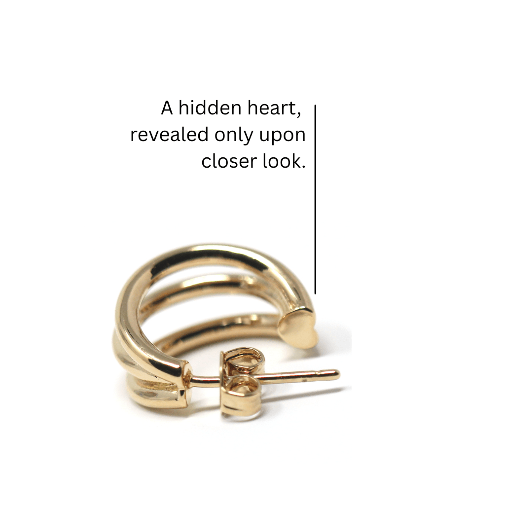 Small gold hoop earrings Trinity design showing hidden heart detail in the hoop structure